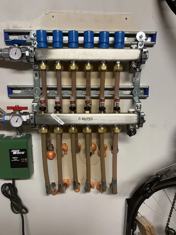 Plumber performing Water Heater Repair at a residential property in Forest Lake